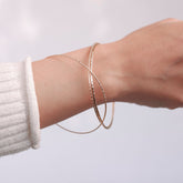 Set of three 18K gold-plated minimalist bangles with a smooth finish